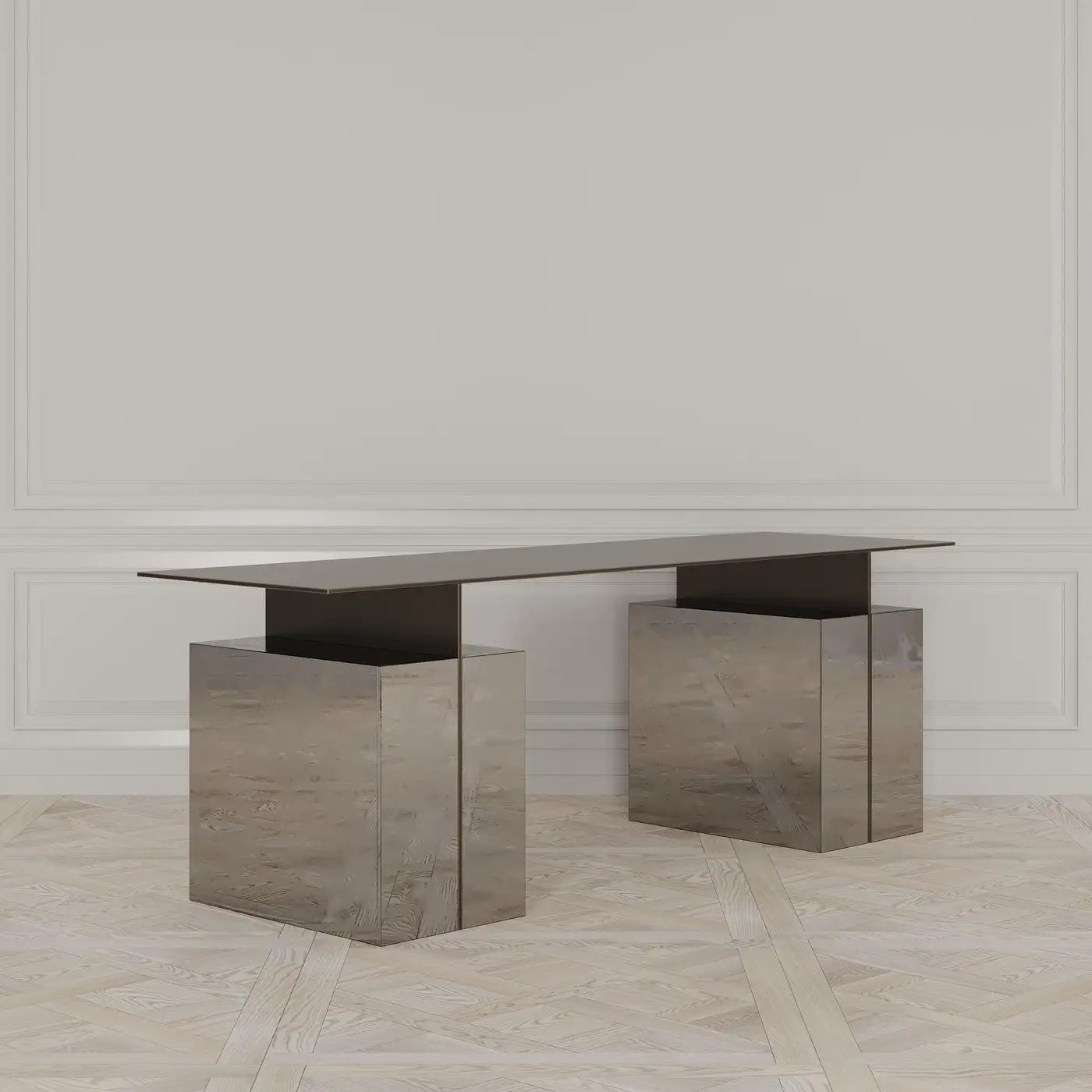 Modern metallic console table against a neutral wall.