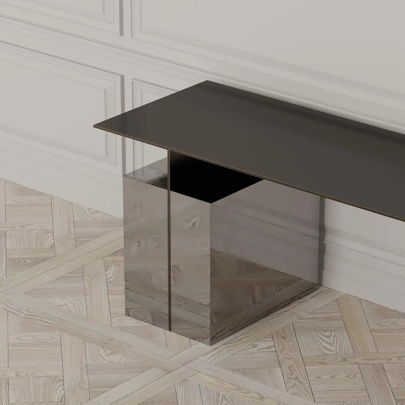 Modern console table with a metallic base against a white wall with geometric patterns.
