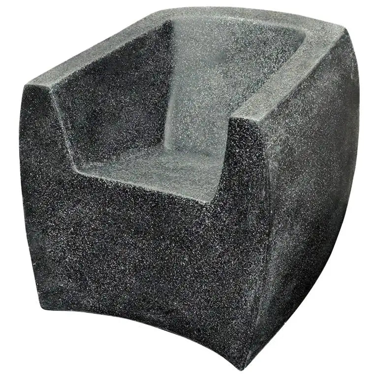 Concrete block with a unique geometric design on a white background