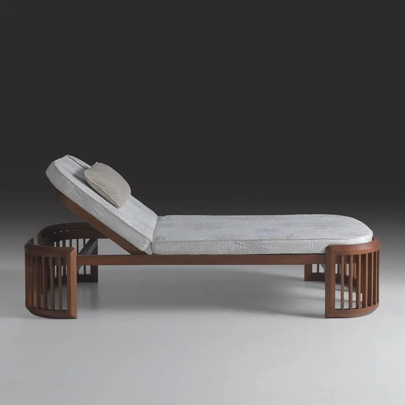 Modern lounge chair with wooden frame and gray cushion on a gradient background