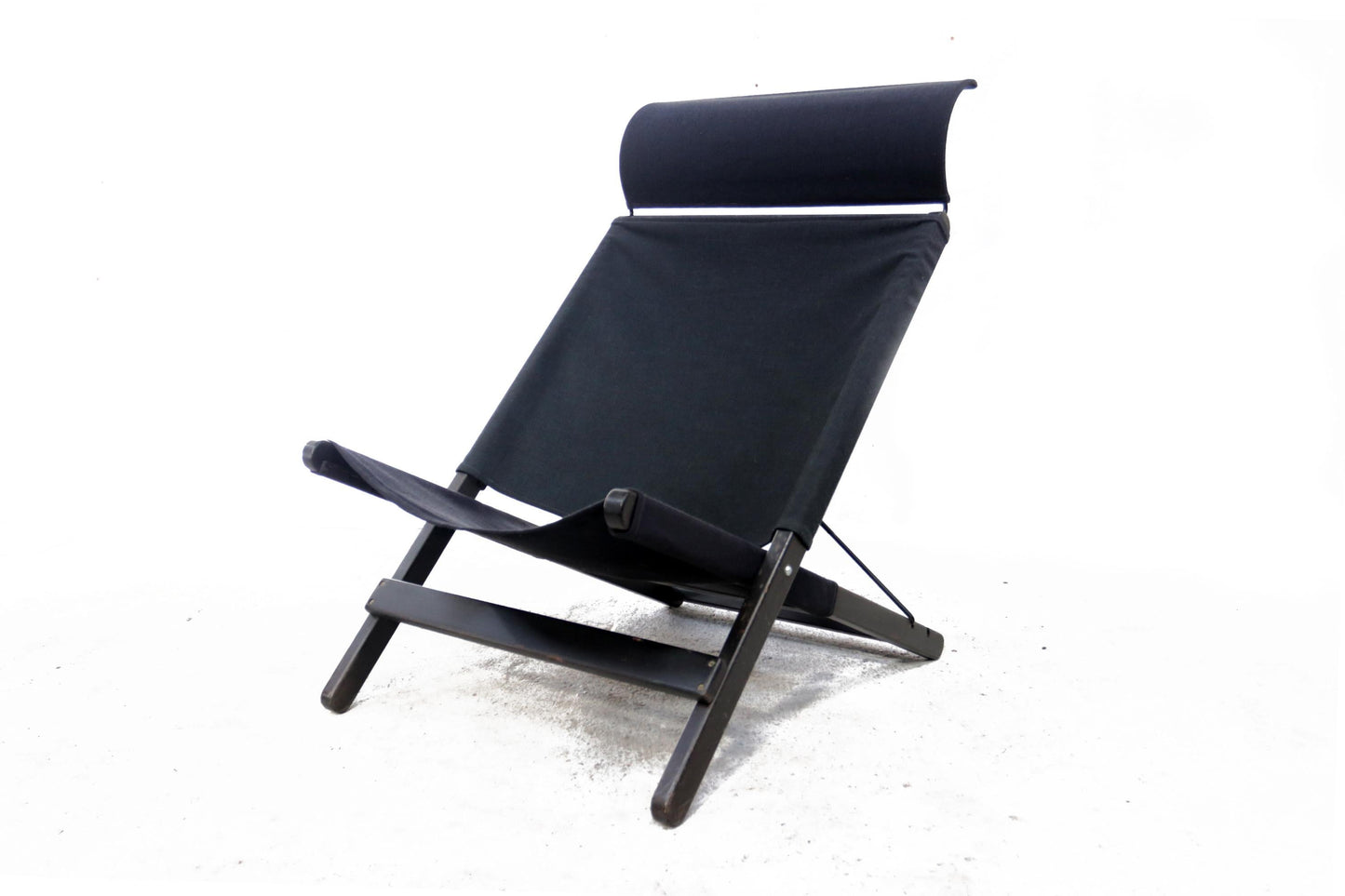 Black folding chair on a white background