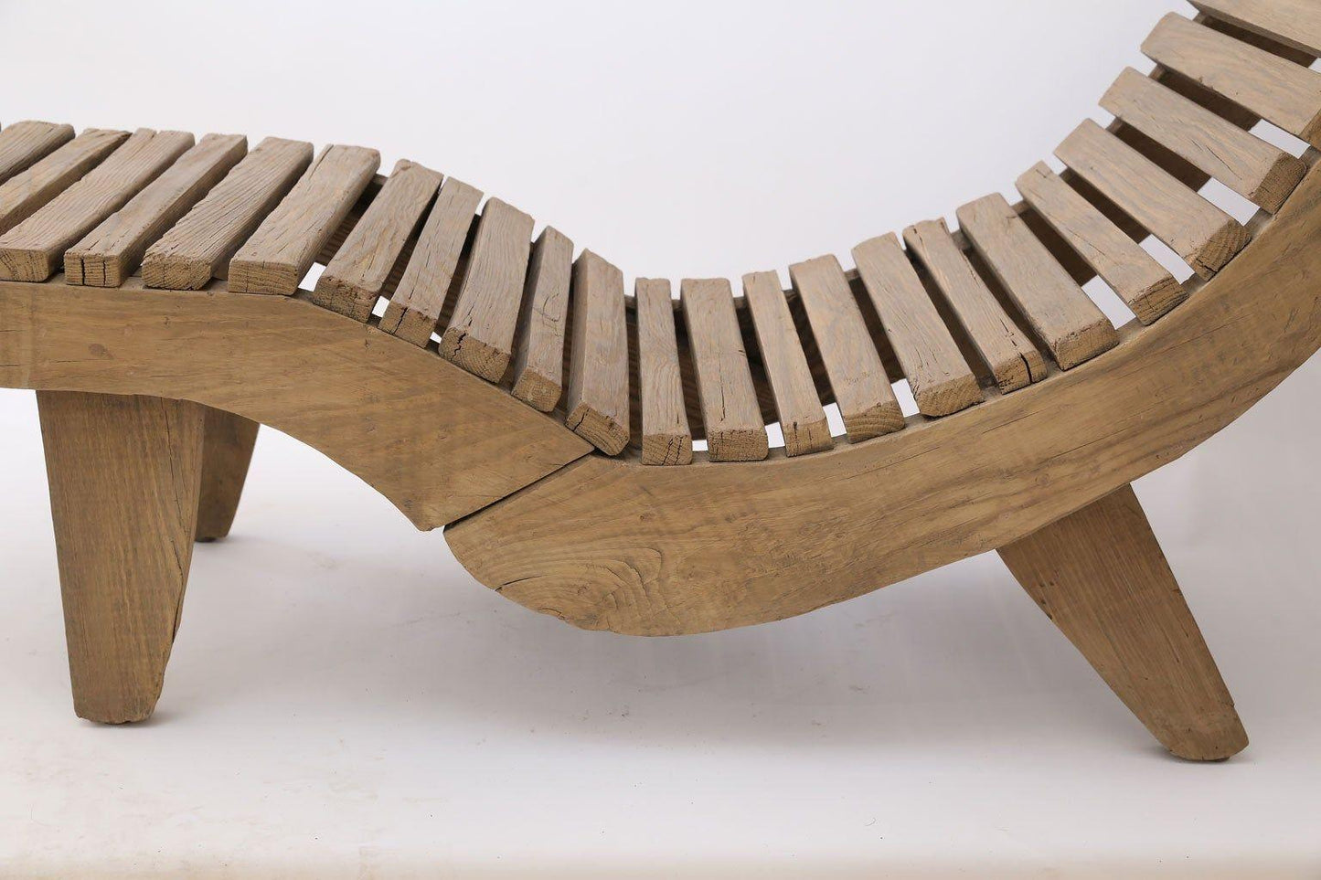 Wooden lounge chair on a white background