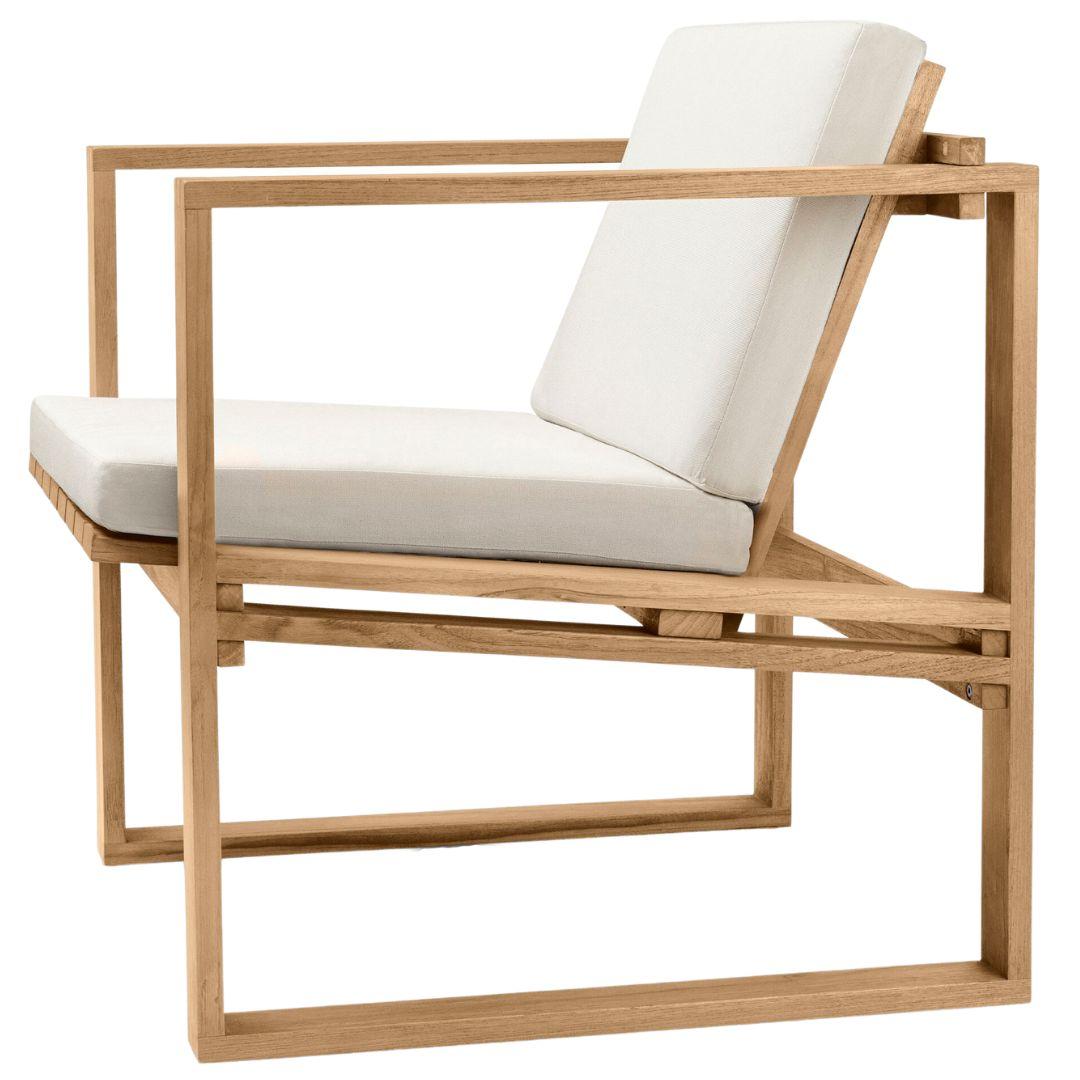 Wooden chair with white cushions on a white background