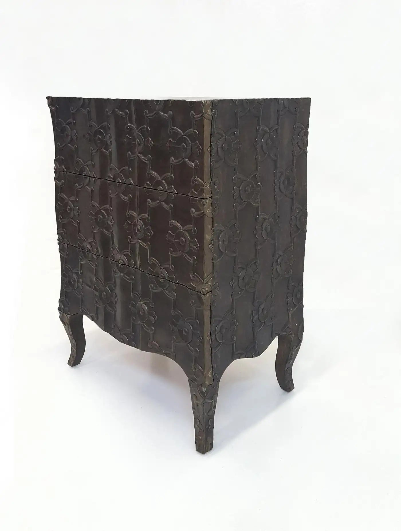 Decorative wooden chest with intricate carvings on a white background
