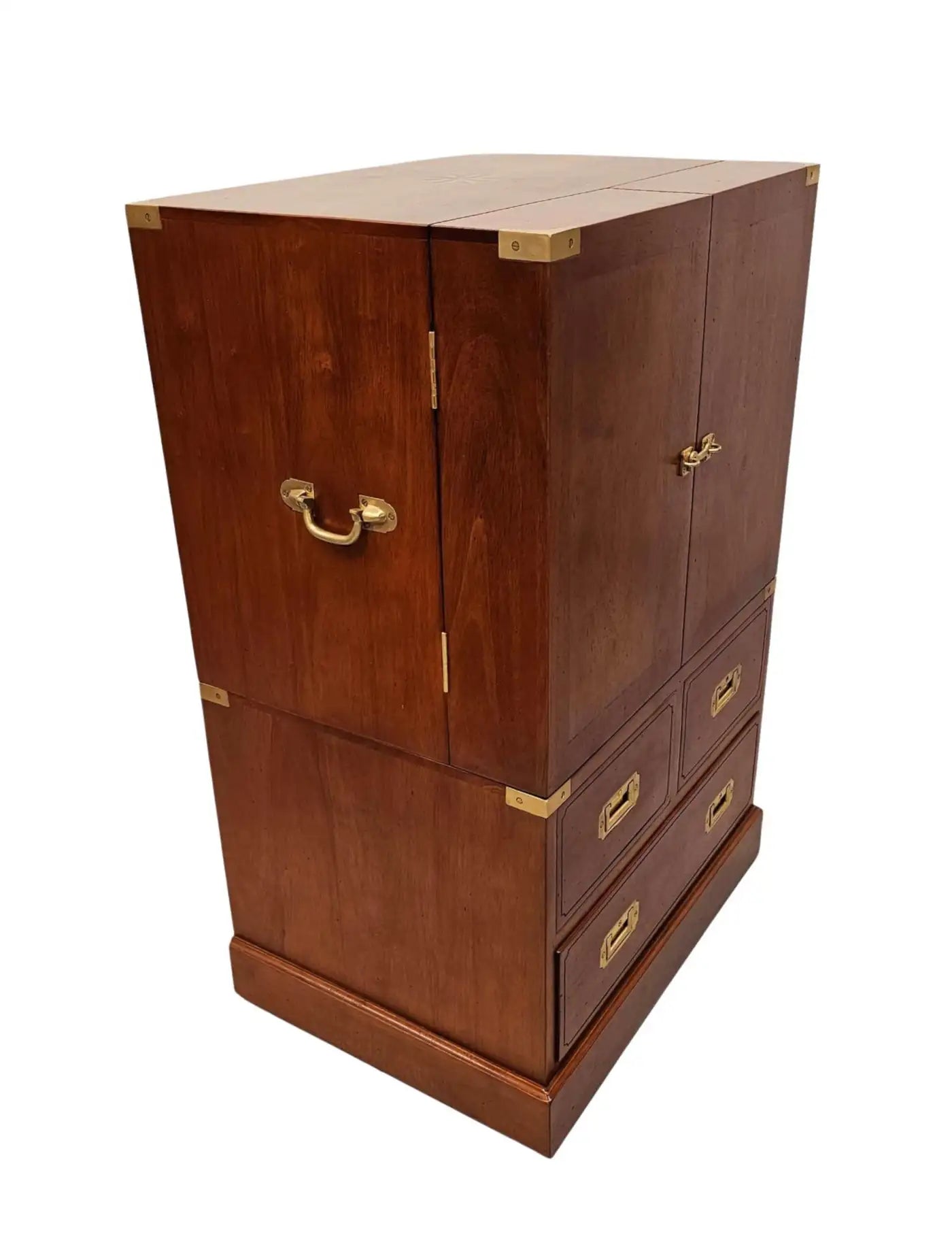 Wooden cabinet with brass handles on a white background