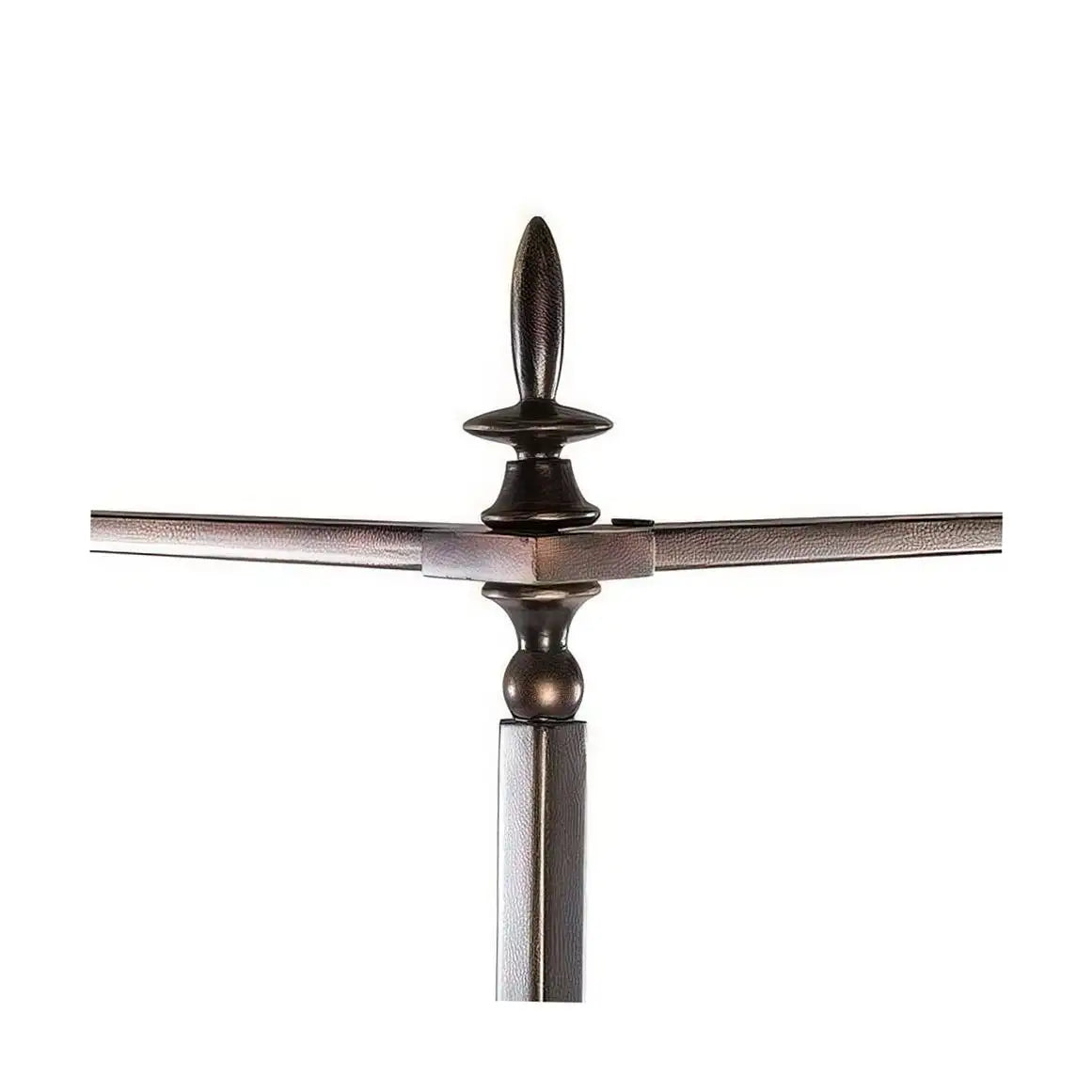 Decorative metal finial on a white background