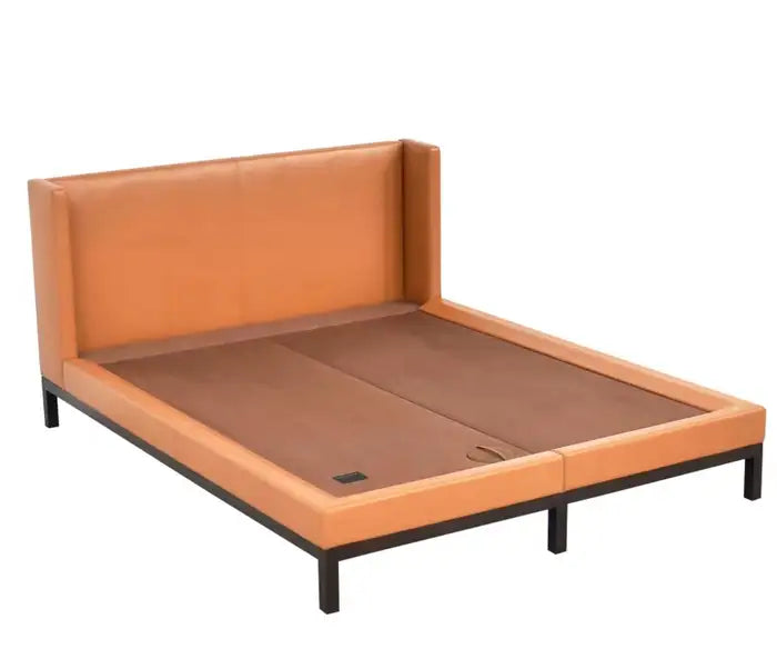 Orange upholstered bed frame on a white background