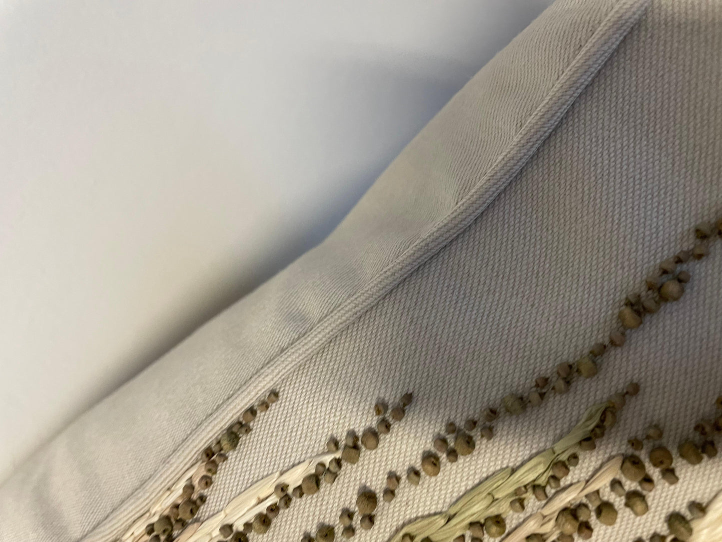 Organic Raffia Embroidered Cushion with Wooden Beads