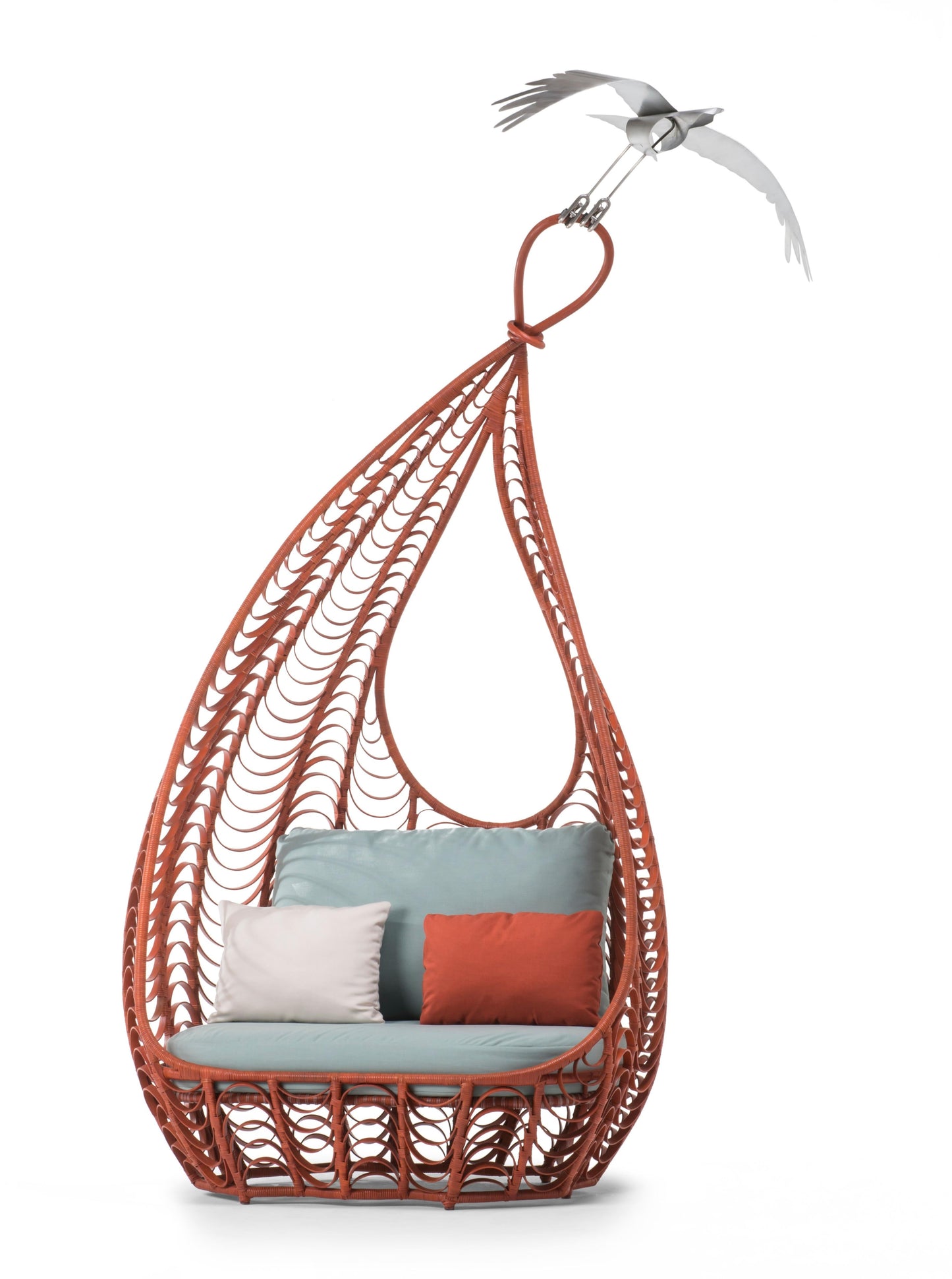 Hanging chair with woven design and cushions on a white background
