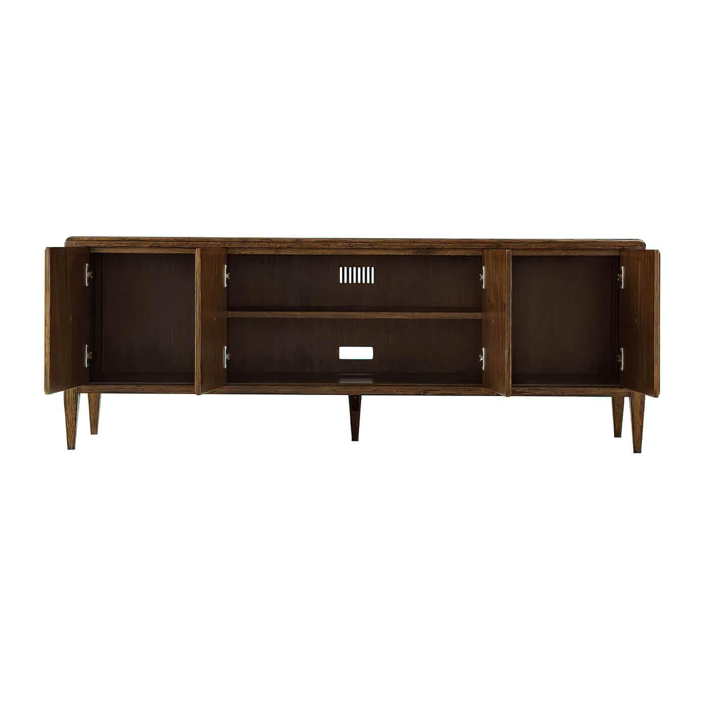 Wooden entertainment console with open doors on a white background