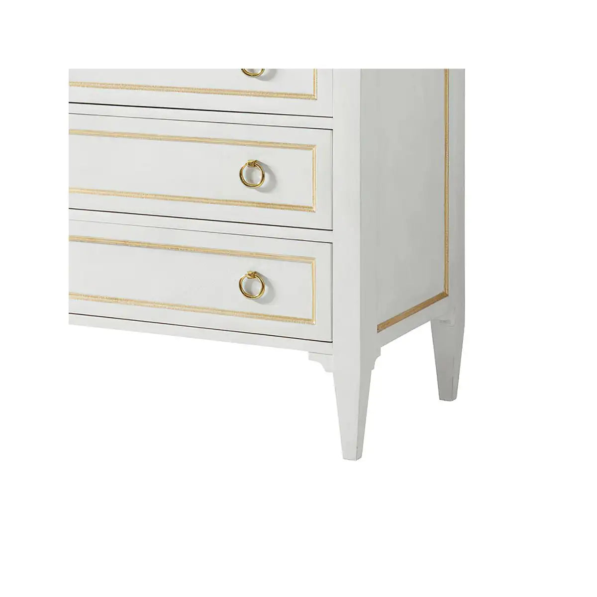 White dresser with gold accents on a white background