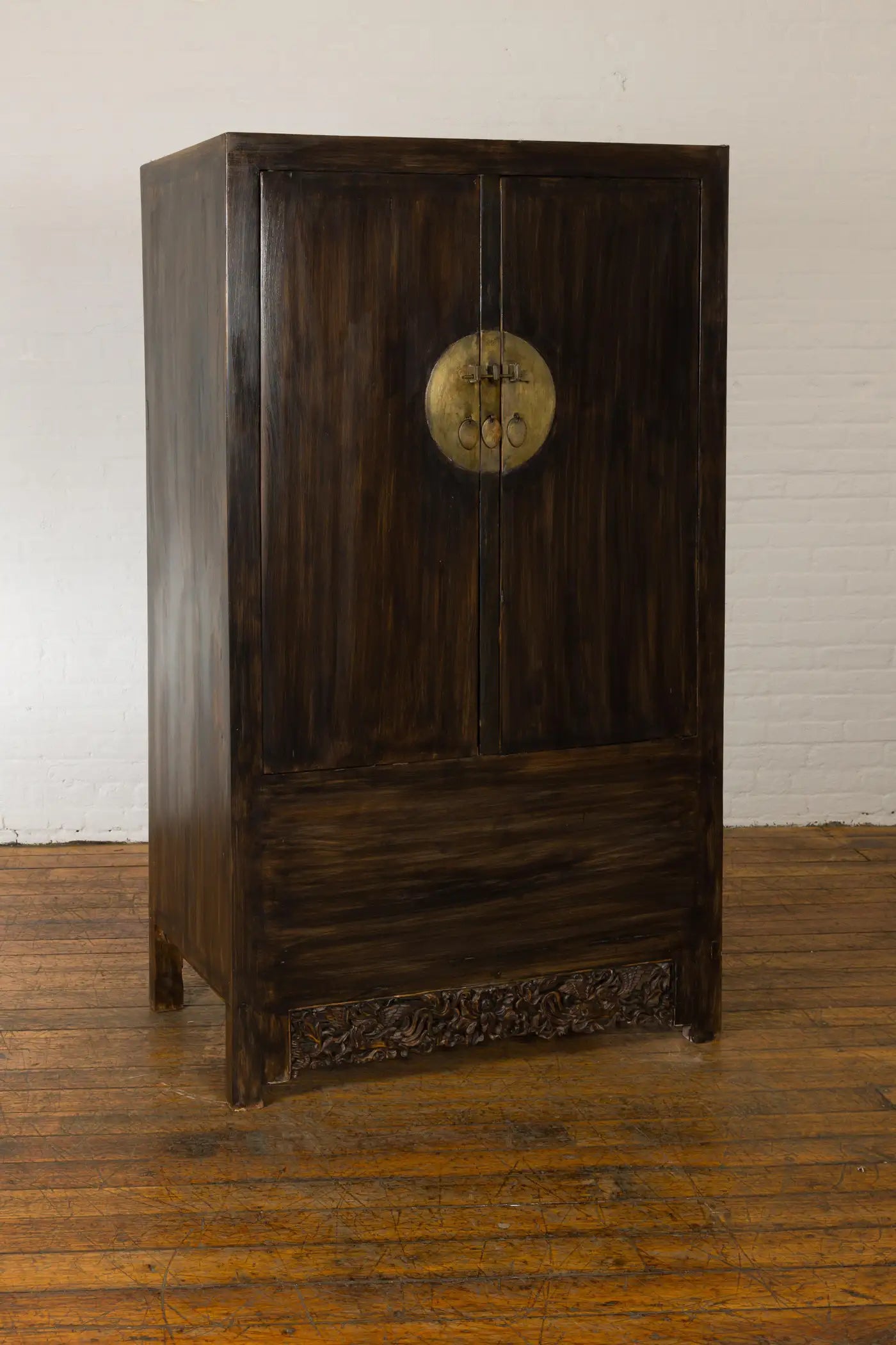ANTIQUE CHINESE QING DYNASTY CABINET WITH CARVED APRON AND BIRDS