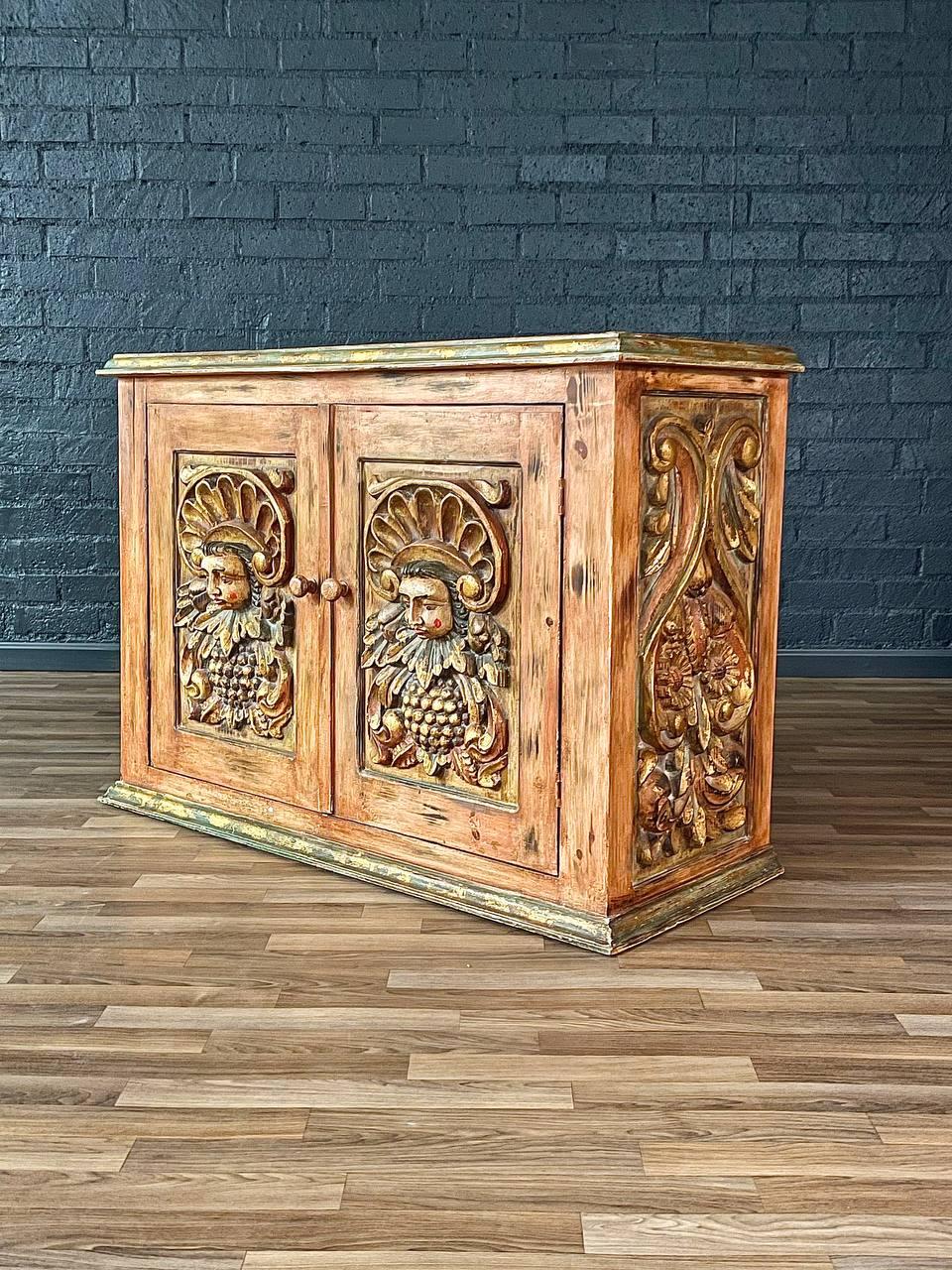 Rustic Spanish Colonial Hacienda Cabinet – Hand-Carved Faces & Floral Motifs
