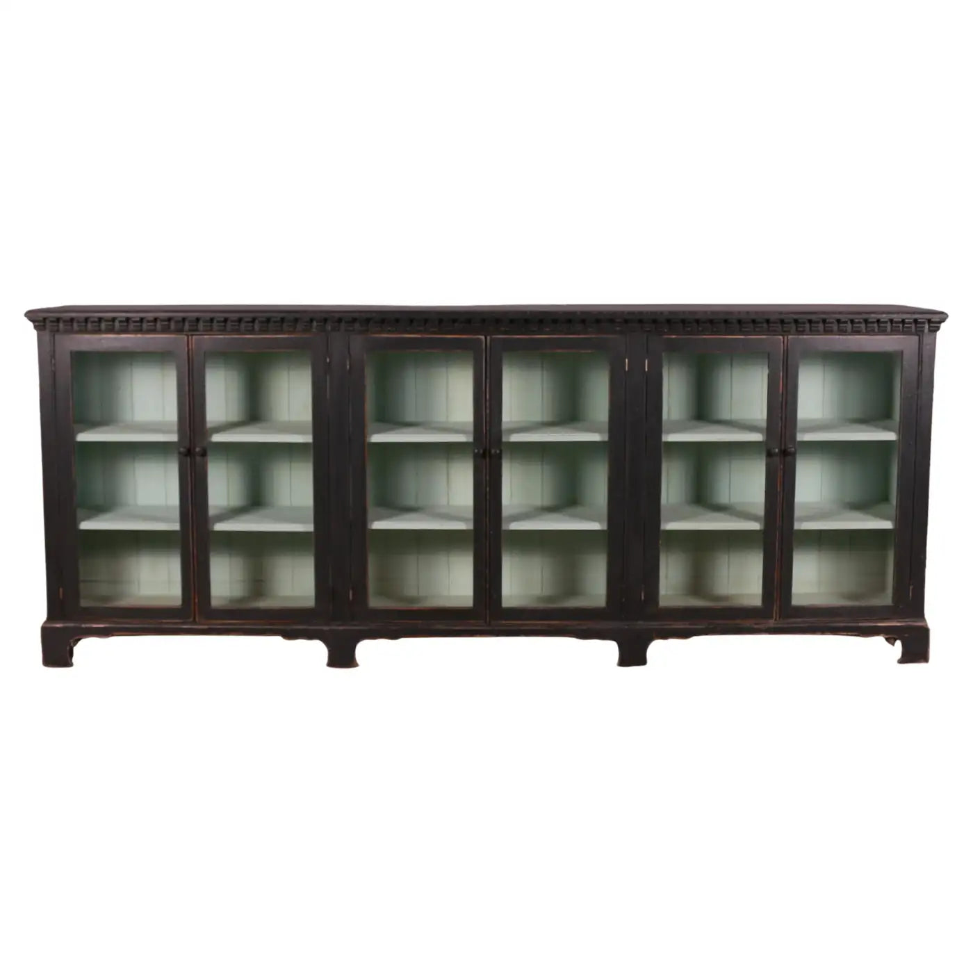 Dark wooden cabinet with glass doors on a white background