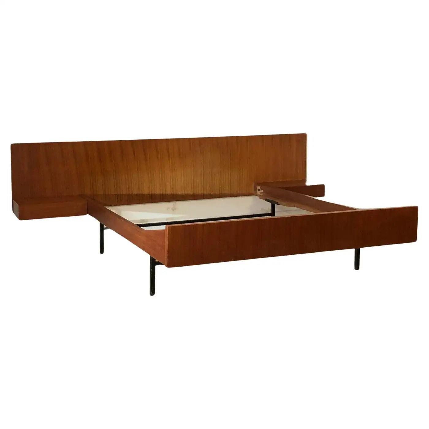 Wooden bed frame with storage compartments on a white background