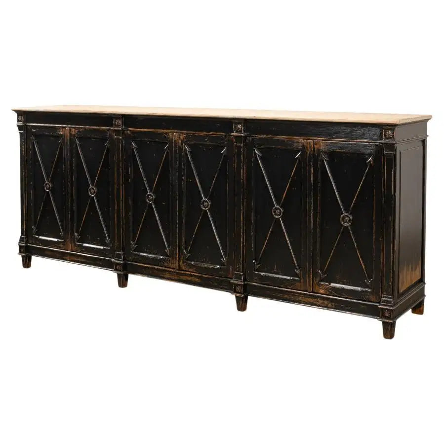 Dark wooden sideboard with decorative cross patterns on a white background