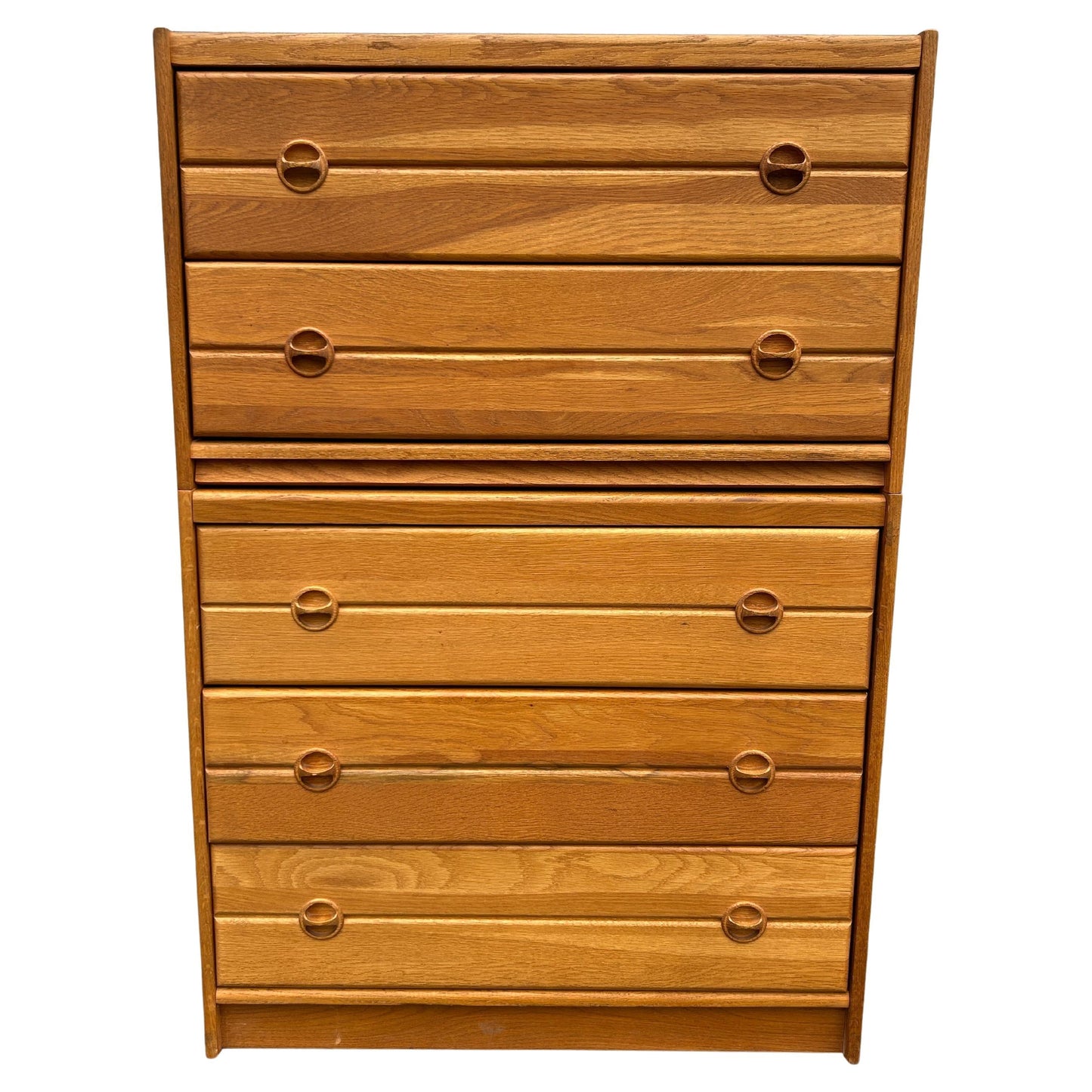 Wooden dresser with multiple drawers on a white background