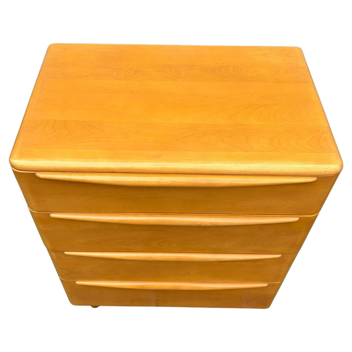Wooden nightstand with three drawers on a white background