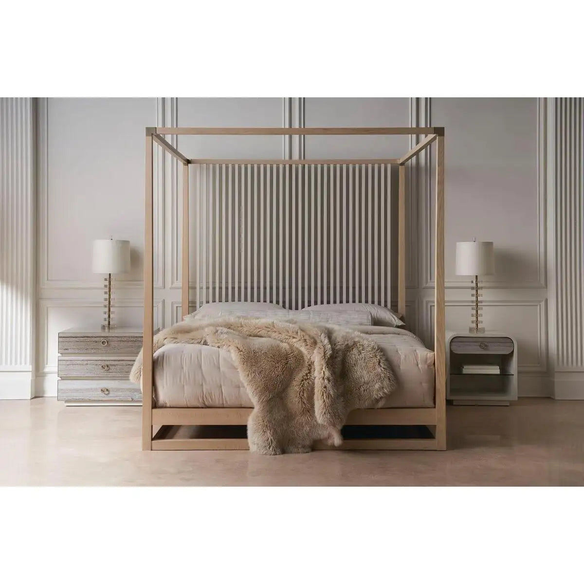 Wooden canopy bed with bedding in a bedroom setting