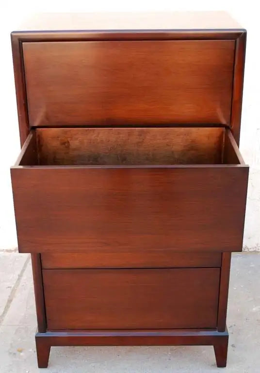 Wooden chest with two drawers on a light background