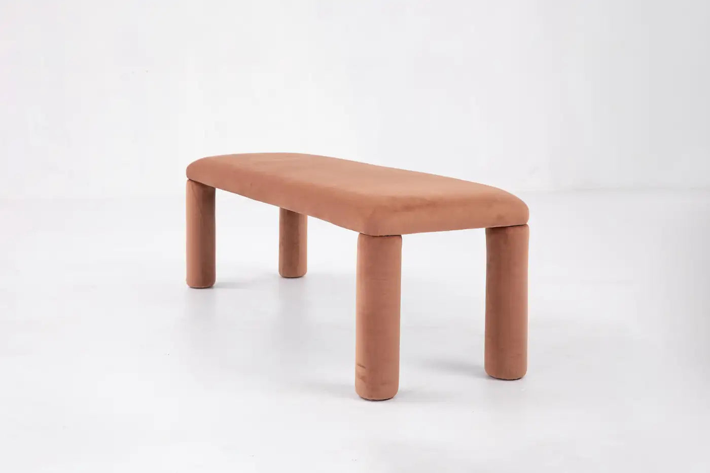 Cushioned stool with a soft texture on a white background