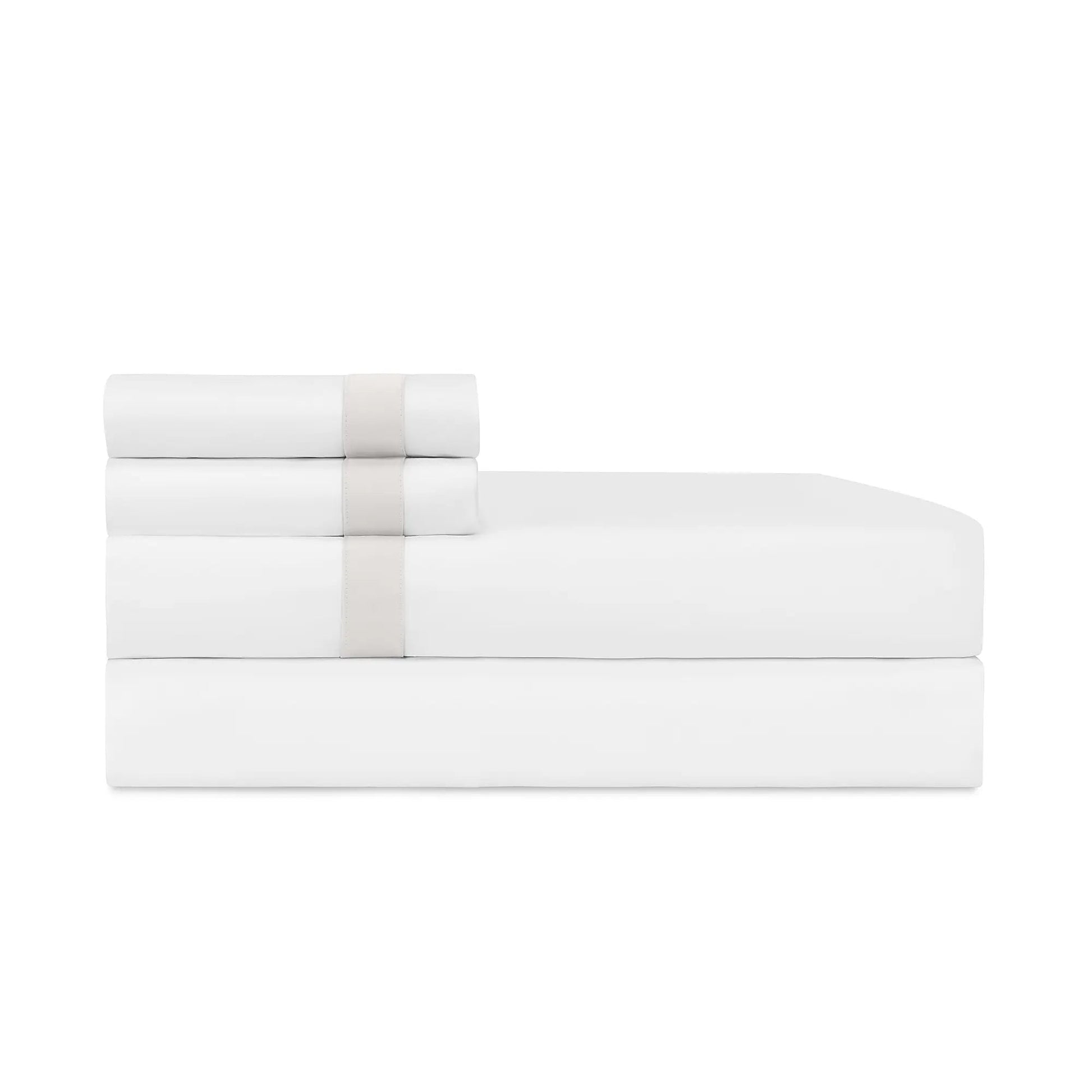White bed sheets and pillowcases on a white background