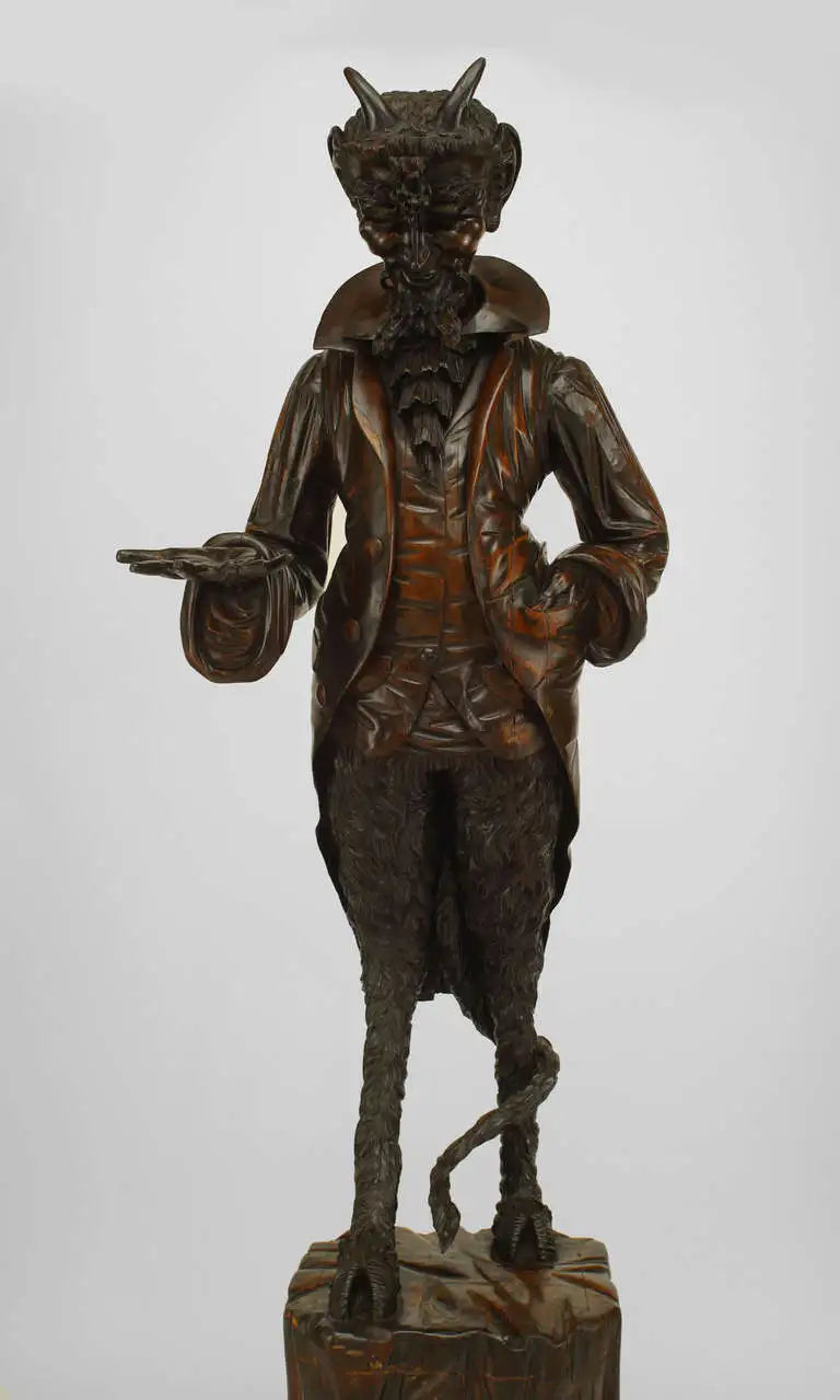 Pair of Renaissance Walnut Devil Figures