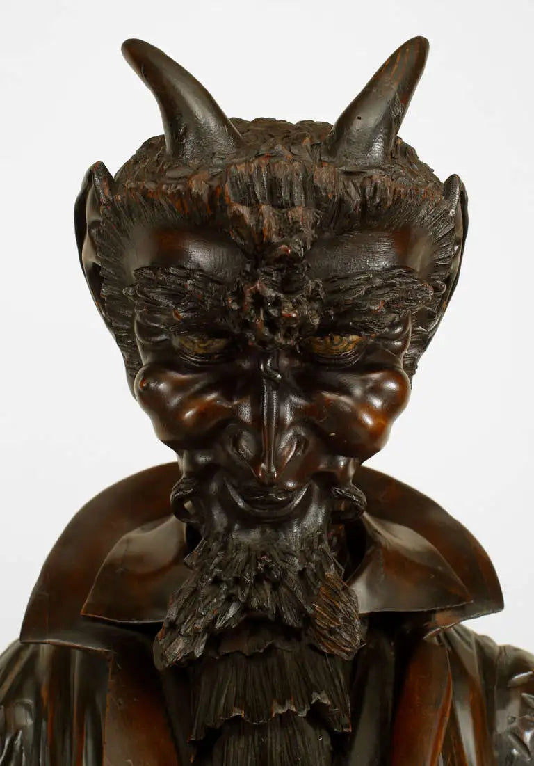 Pair of Renaissance Walnut Devil Figures