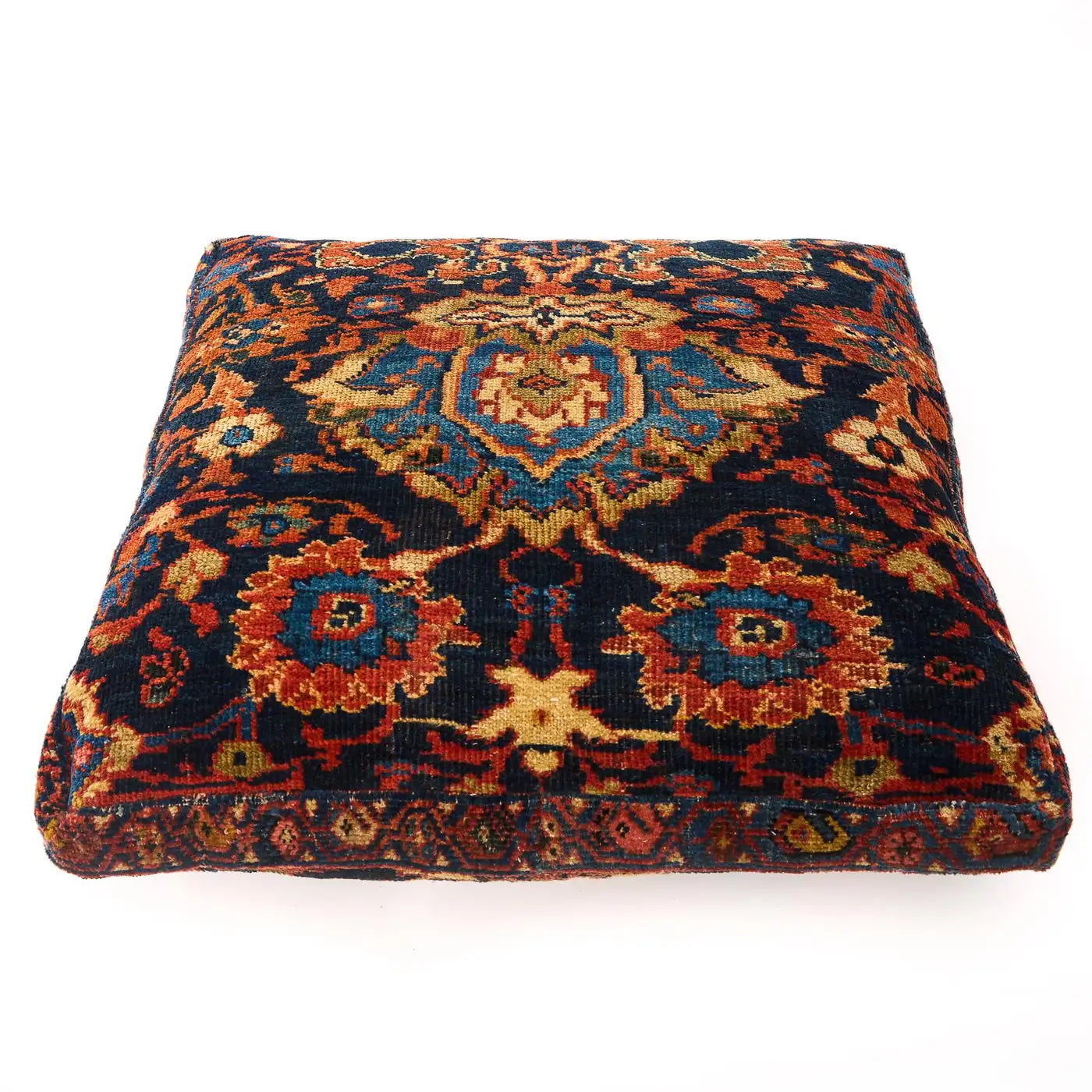 Decorative pillow with intricate pattern on a white background
