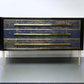 Decorative cabinet with blue and gold pattern on a white background