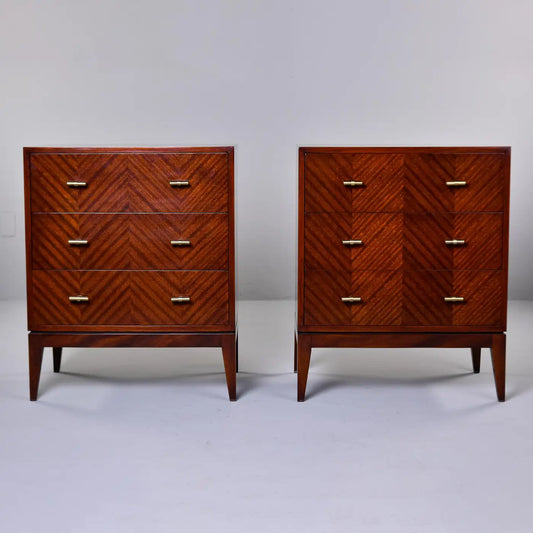 Two wooden dressers with a chevron pattern on a white background