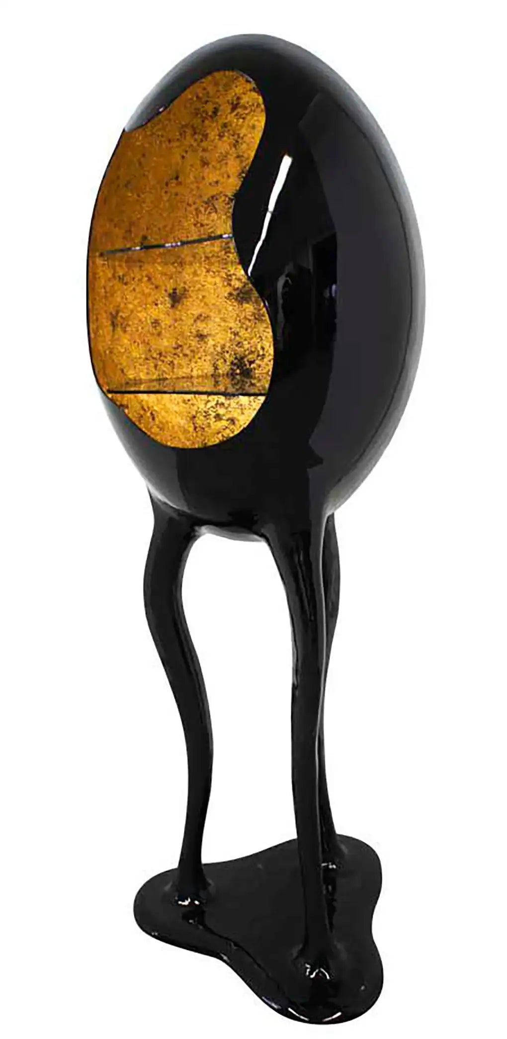 Black and gold artistic sculpture on a white background