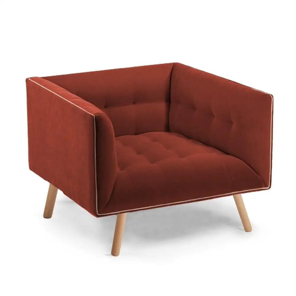 Red armchair with wooden legs on a white background