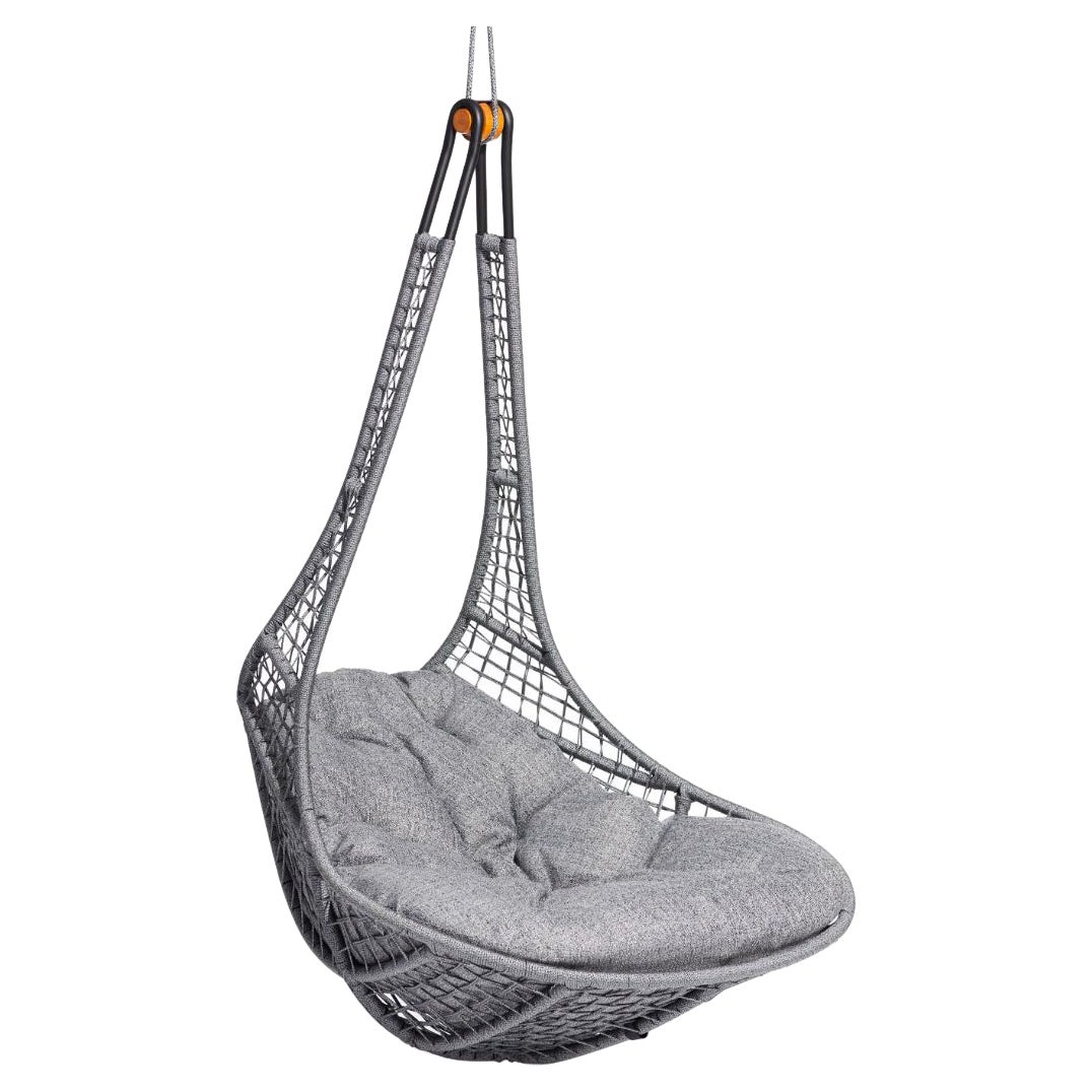 Hanging chair with gray cushion on a white background