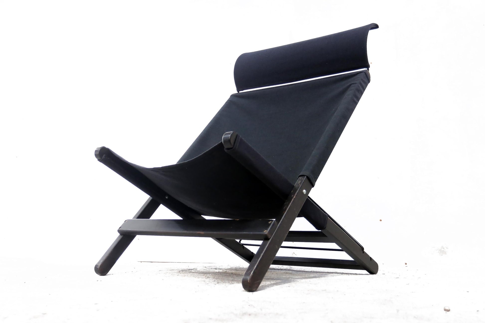 Black lounge chair on a white background