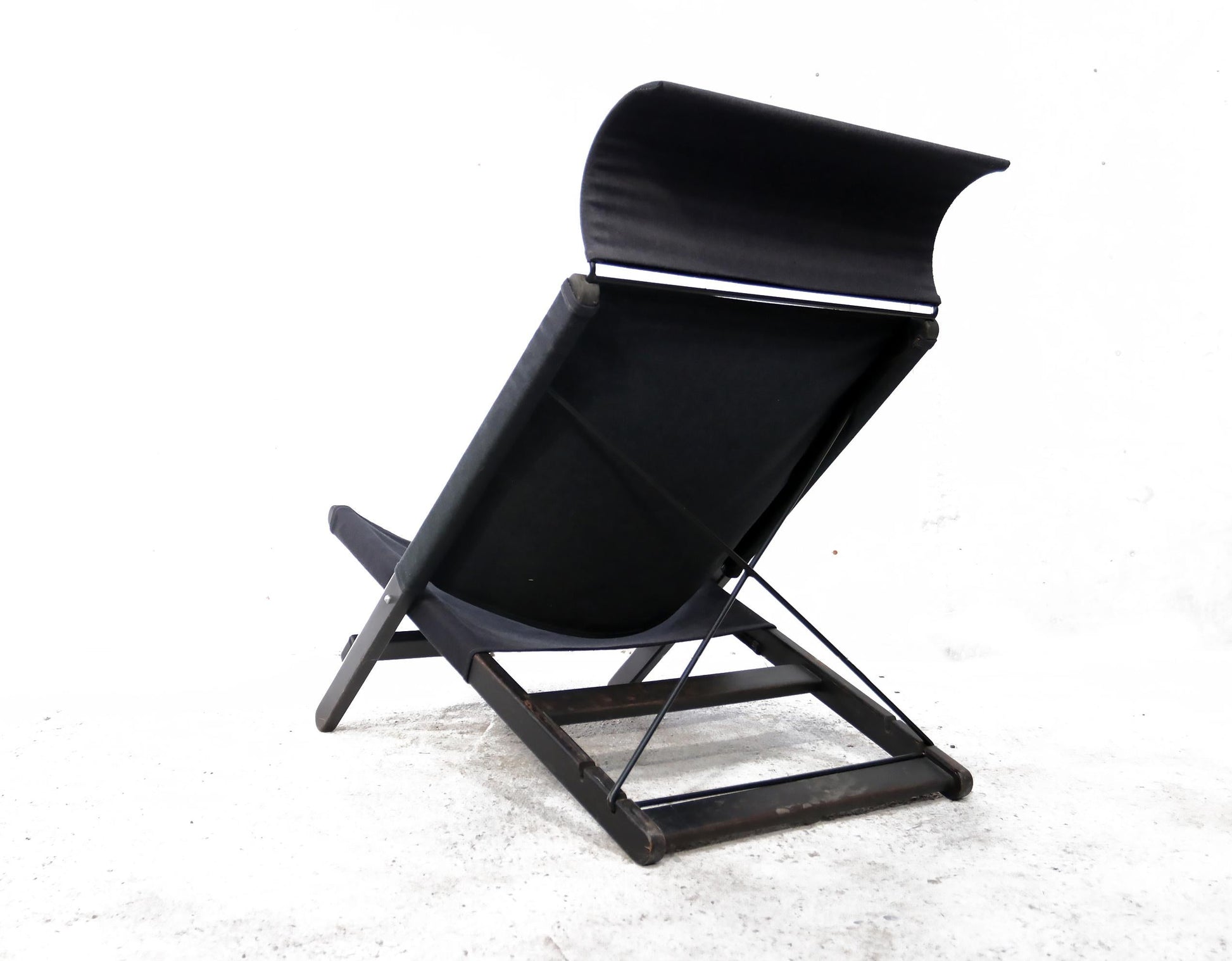Modern black lounge chair on a white background