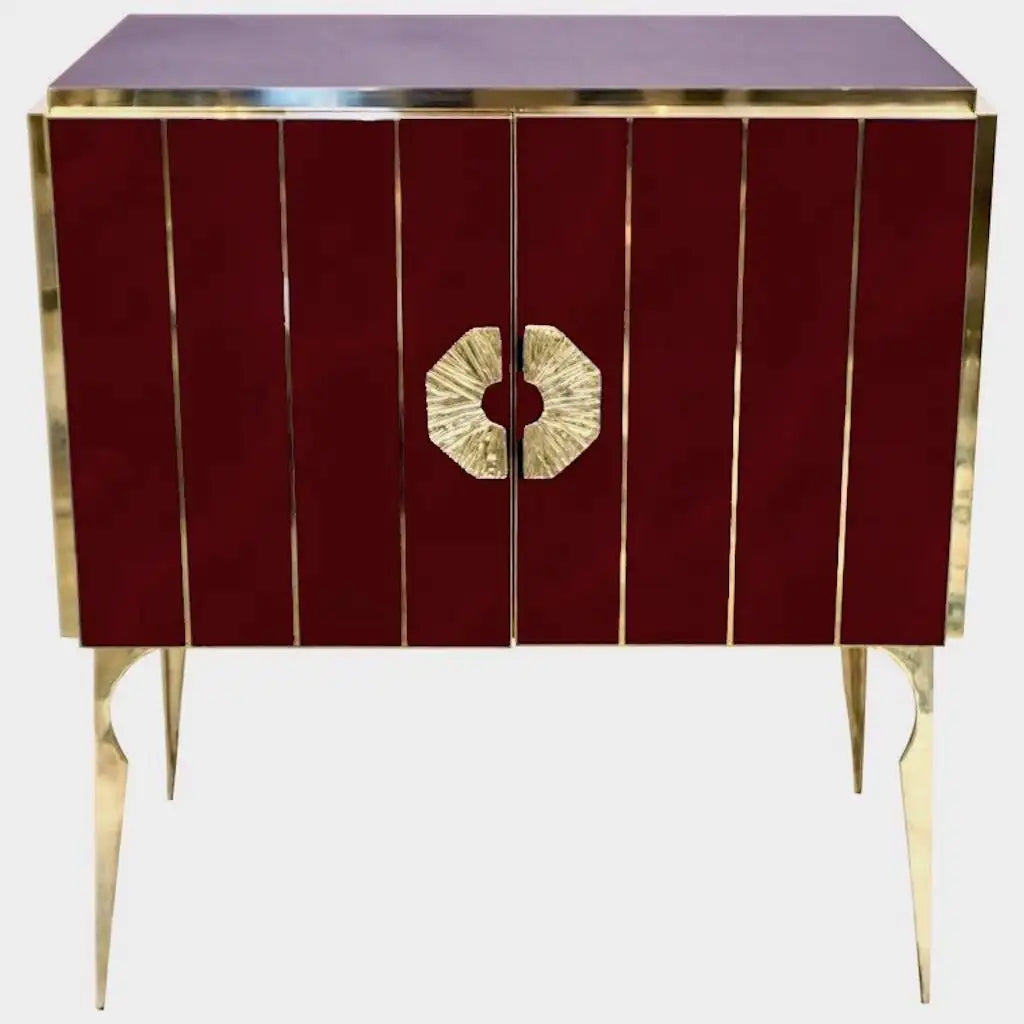 Decorative cabinet with red panel design and gold accents on a white background
