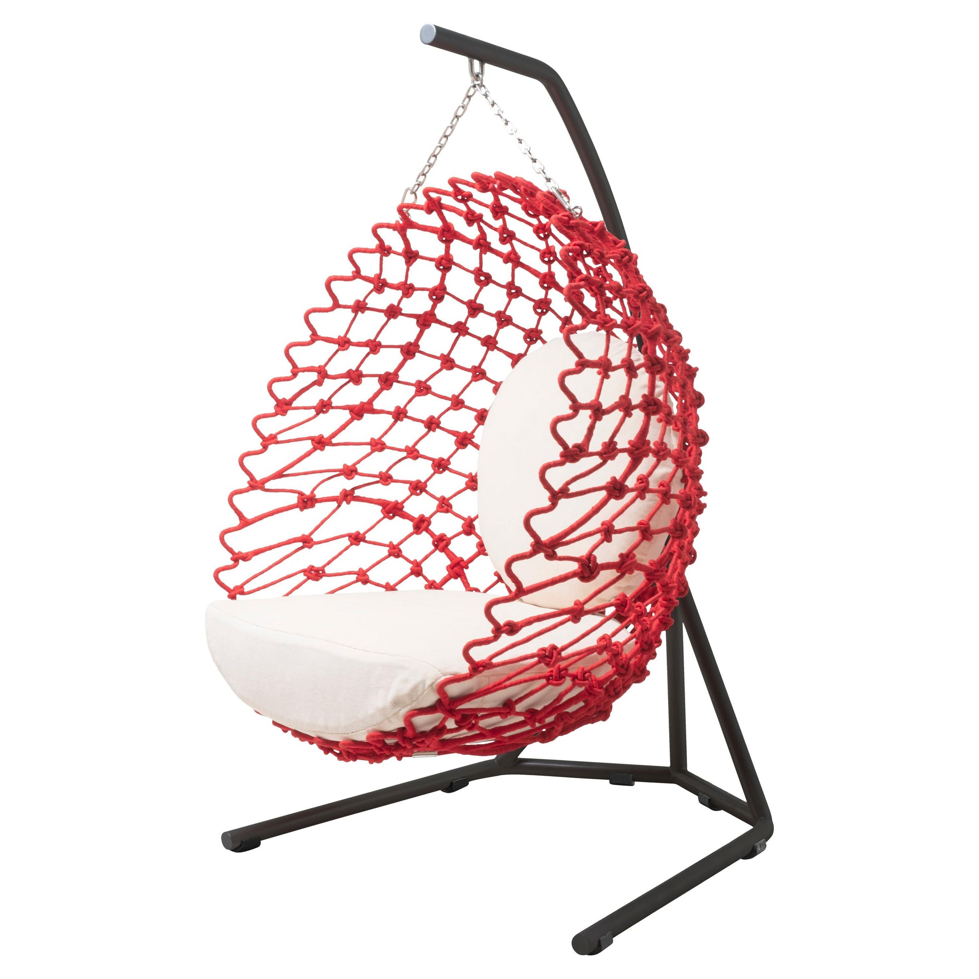 Red netted hanging chair with white cushion on a black stand against a white background