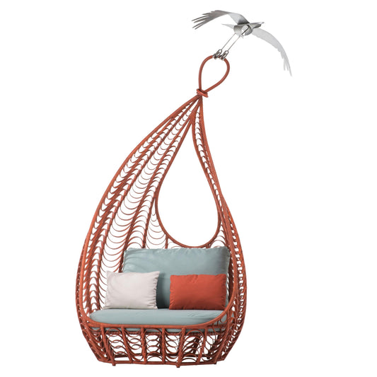 Hanging egg-shaped chair with cushions on a white background