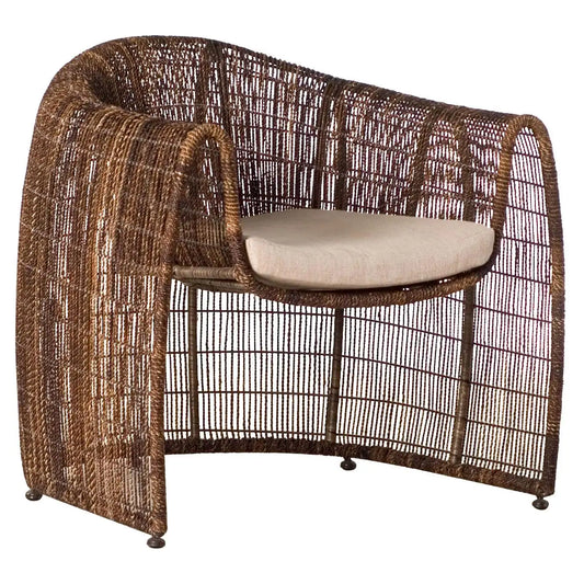 Wicker chair with a cushion on a white background