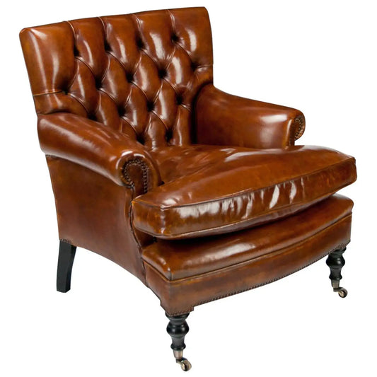 Brown leather armchair with tufted backrest on a white background