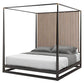 Black metal canopy bed with white bedding on a white background