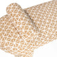 Roll of fabric with a geometric pattern on a white background
