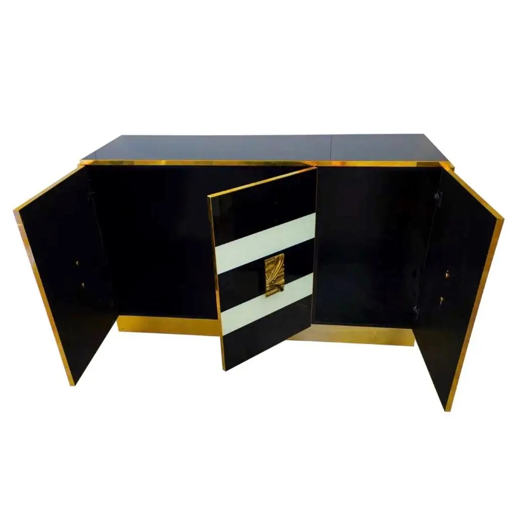Black and gold sideboard with open doors on a white background