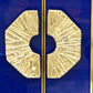 Gold decorative elements on a blue background