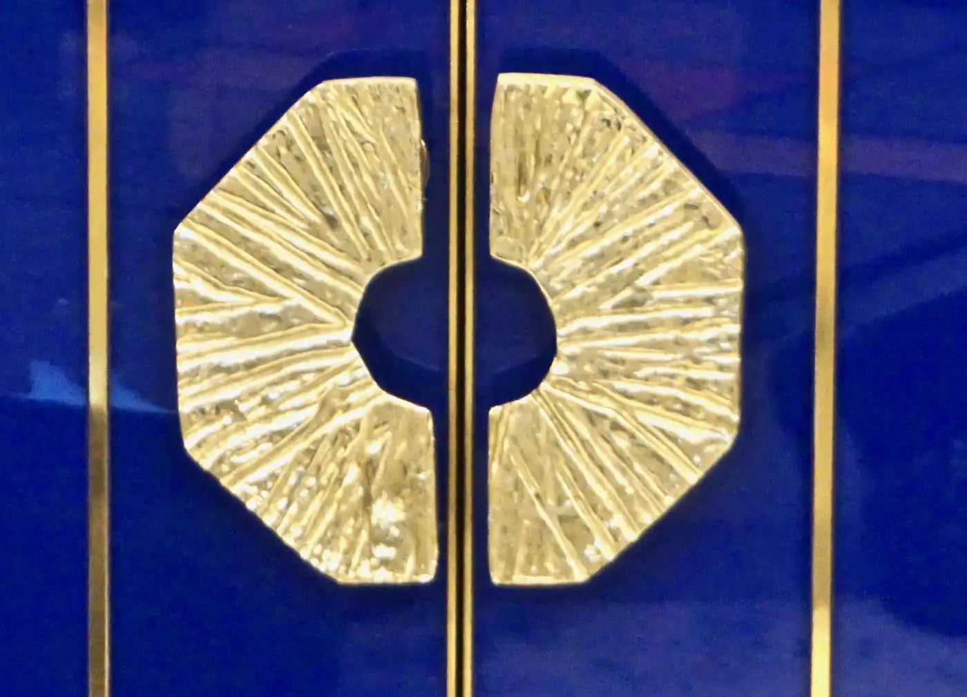 Gold decorative elements on a blue background