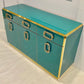 Teal console table with gold accents on a white background