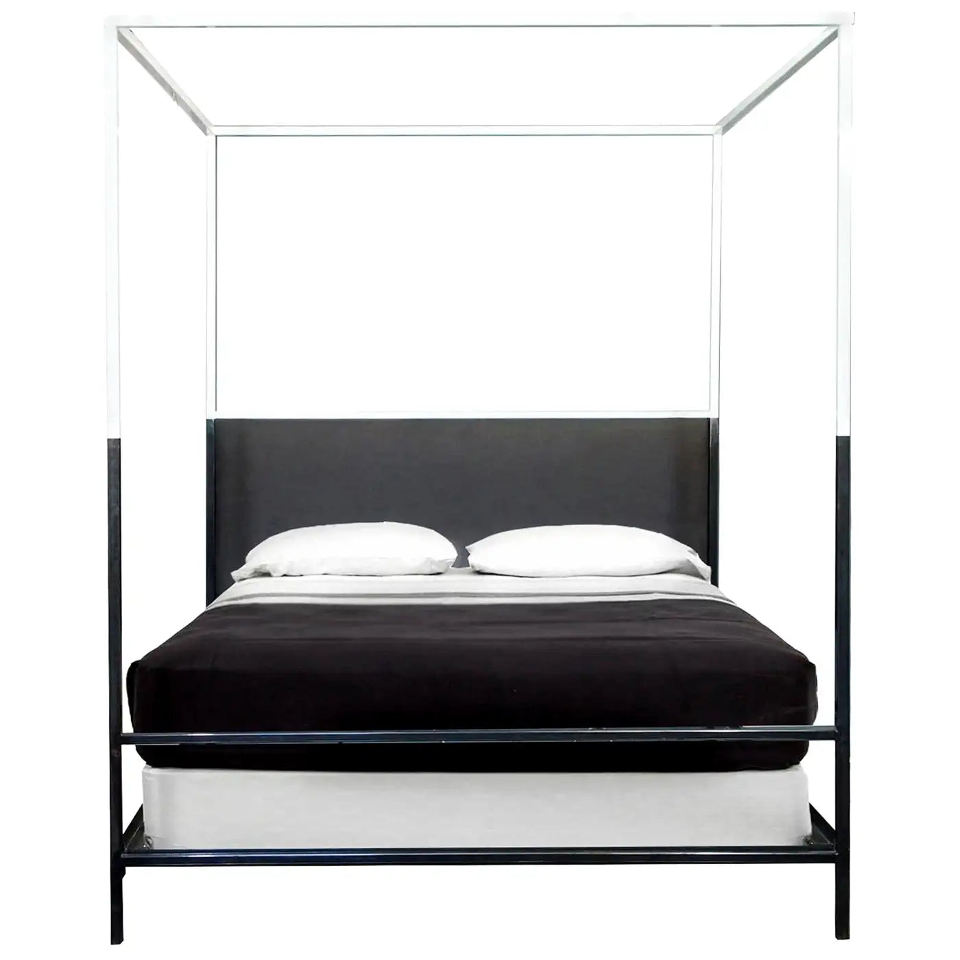 Black metal canopy bed with white bedding on a white background