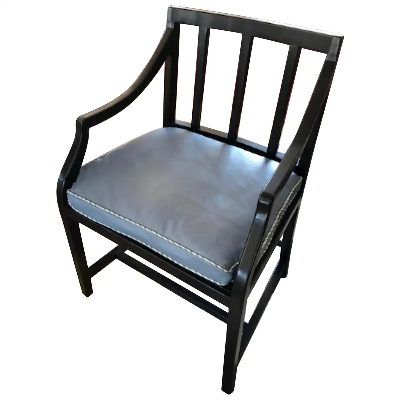 Black armchair with a gray cushion on a white background