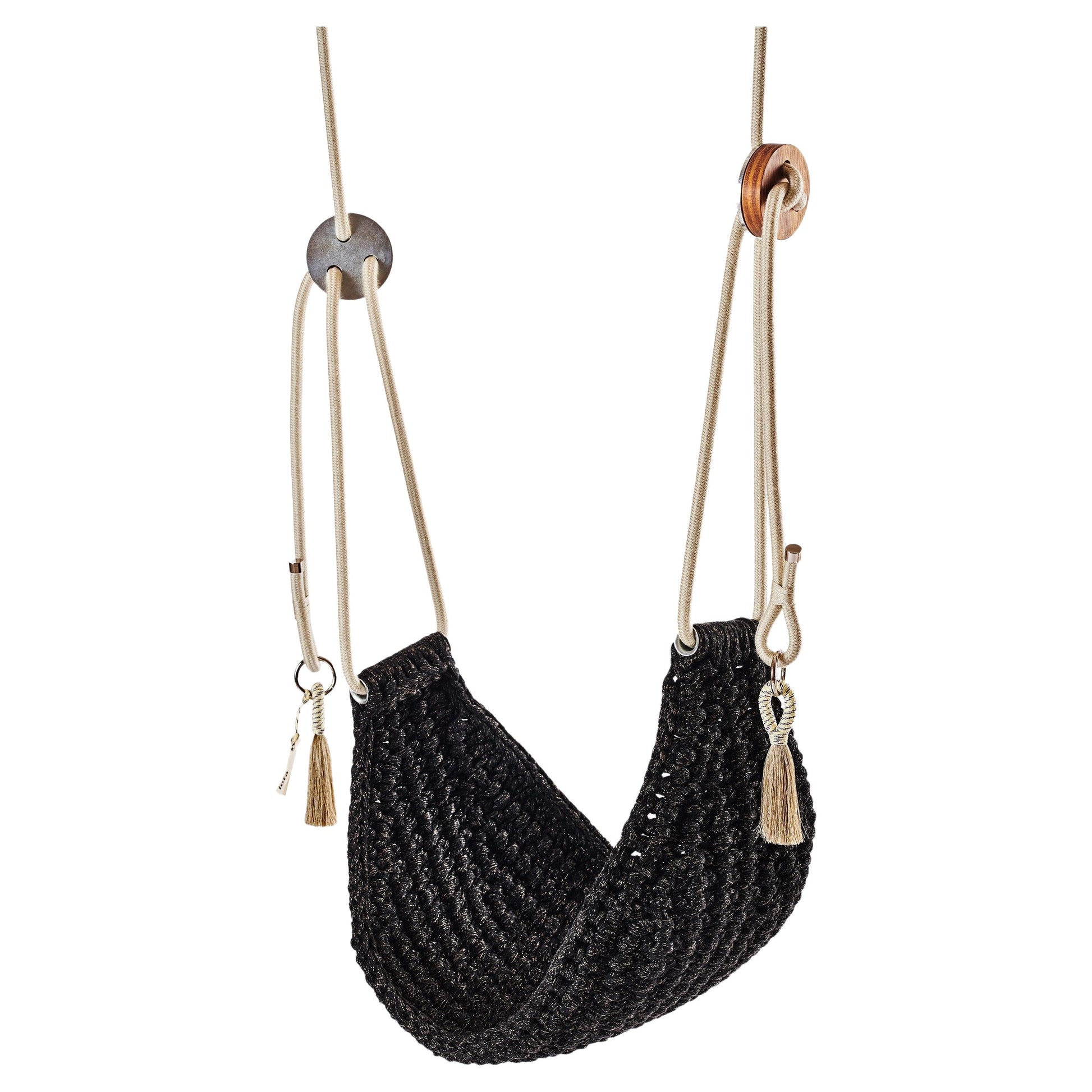 Black woven swing with beige ropes on a white background